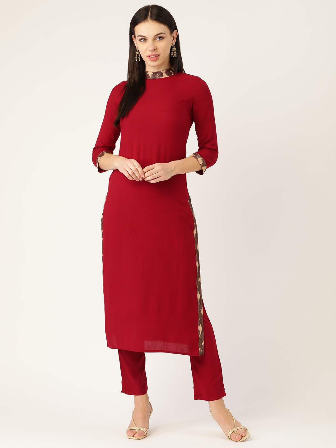 

Cottinfab Women Maroon Solid Kurta with Trousers