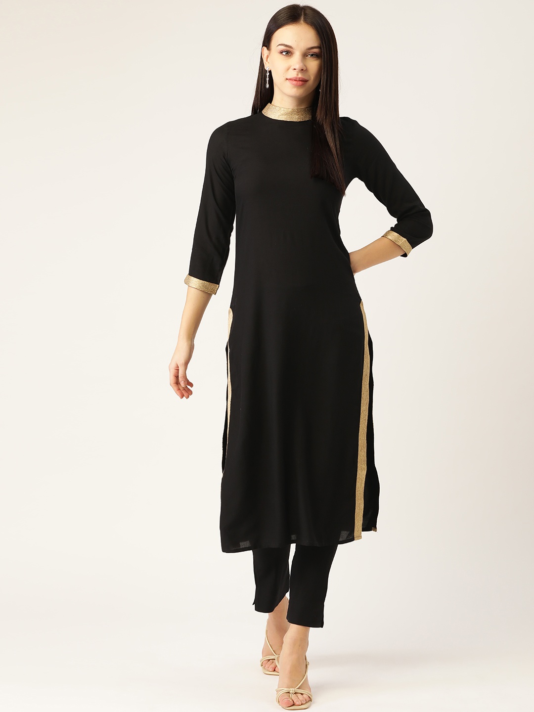 

Cottinfab Women Black Solid Kurta with Trousers
