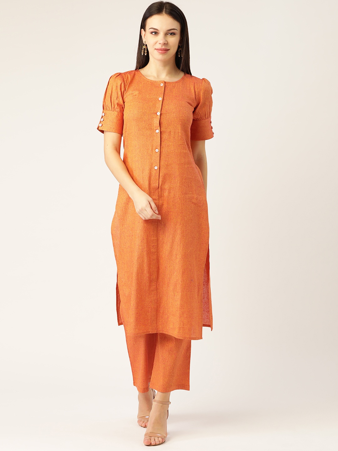 

Cottinfab Women Orange Solid Kurta with Palazzos