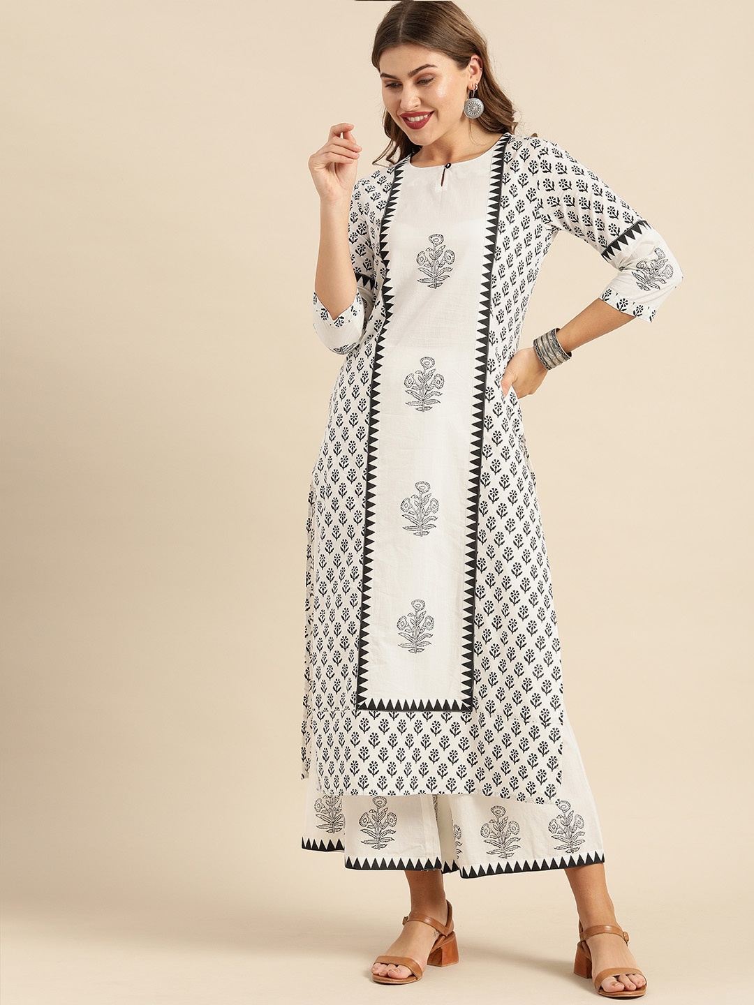 

Varanga Women White & Black Printed Kurta with Palazzos