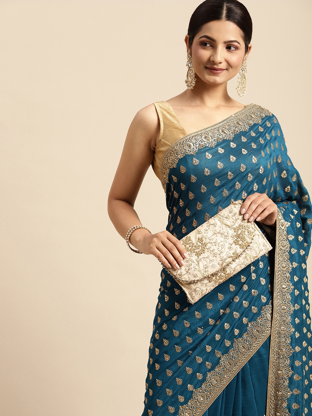 

MOHEY Teal Blue & Golden Ethnic Motifs Silk Blend Saree