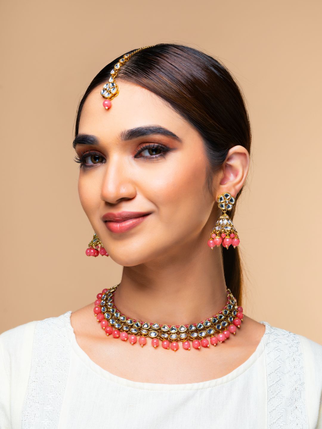 

Priyaasi Gold-Plated Pink & White Kundan-Studded Beaded Handcrafted Jewellery Set