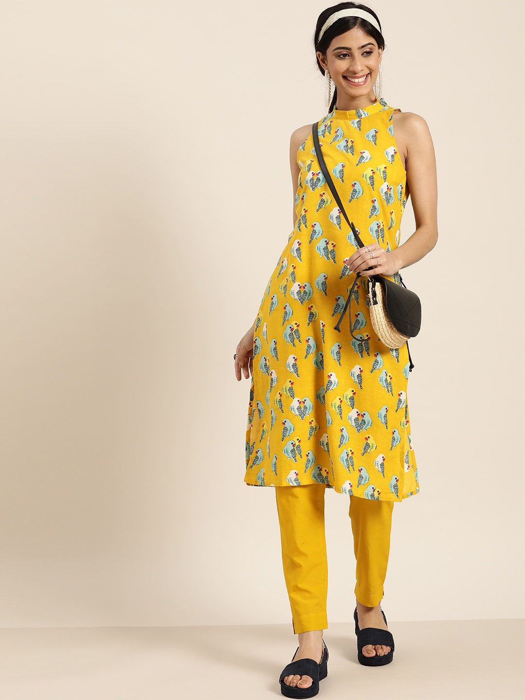 

Sangria Women Mustard Yellow & Blue Printed Kurta with Trousers