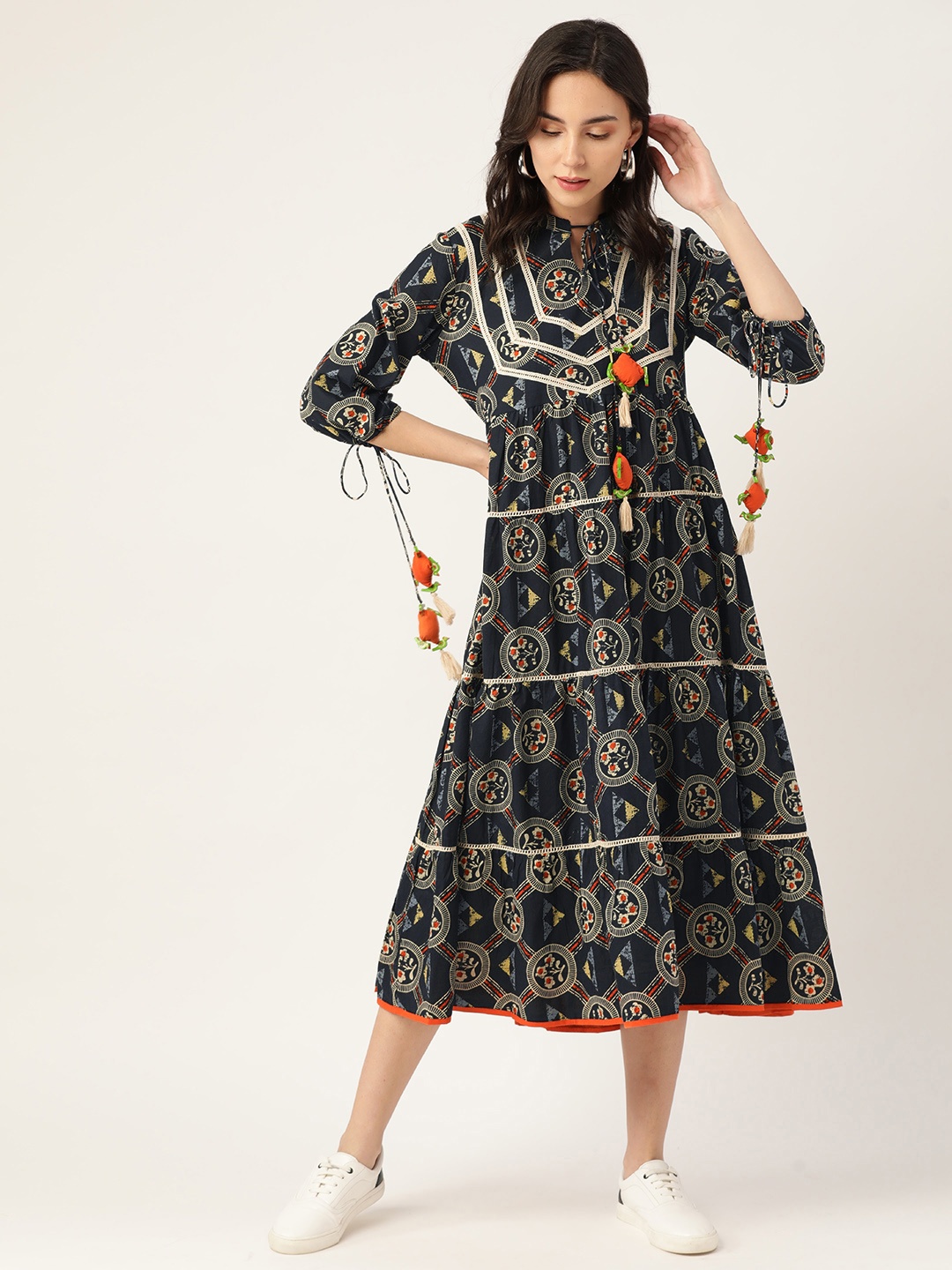 

Sangria Women Navy Blue & Grey Pure Cotton Ethnic Print Tie-Up Neck A-Line Tiered Dress