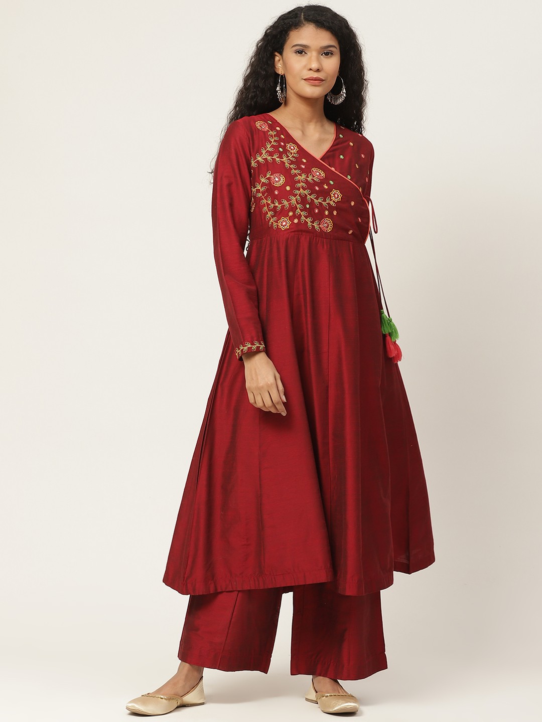 

Sangria Women Maroon & Golden Ethnic Motifs Embroidered Angrakha Kurta Set