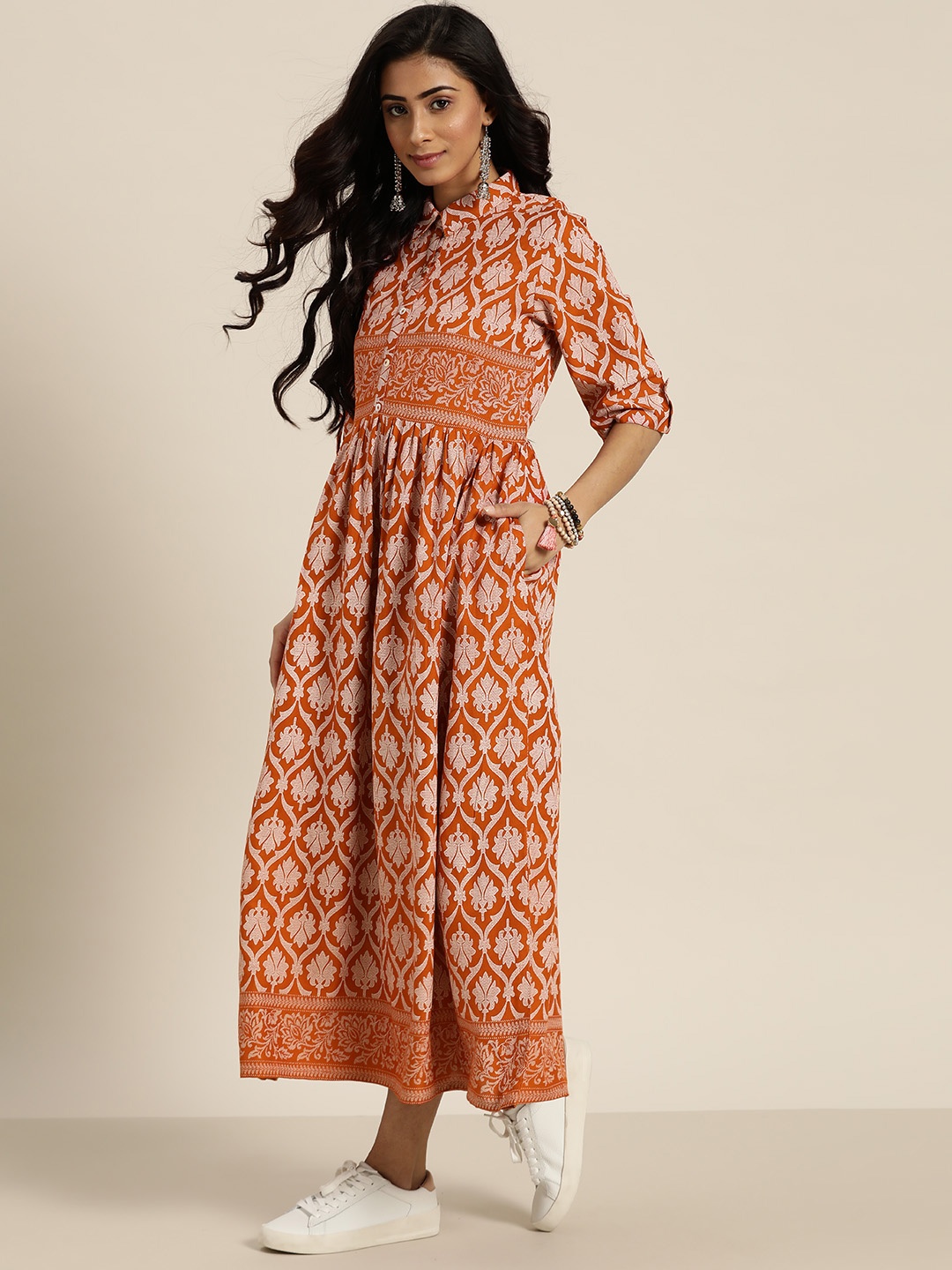 

Sangria Women Rust Orange And Off-White Ethnic Motifs Printed Shirt Dress