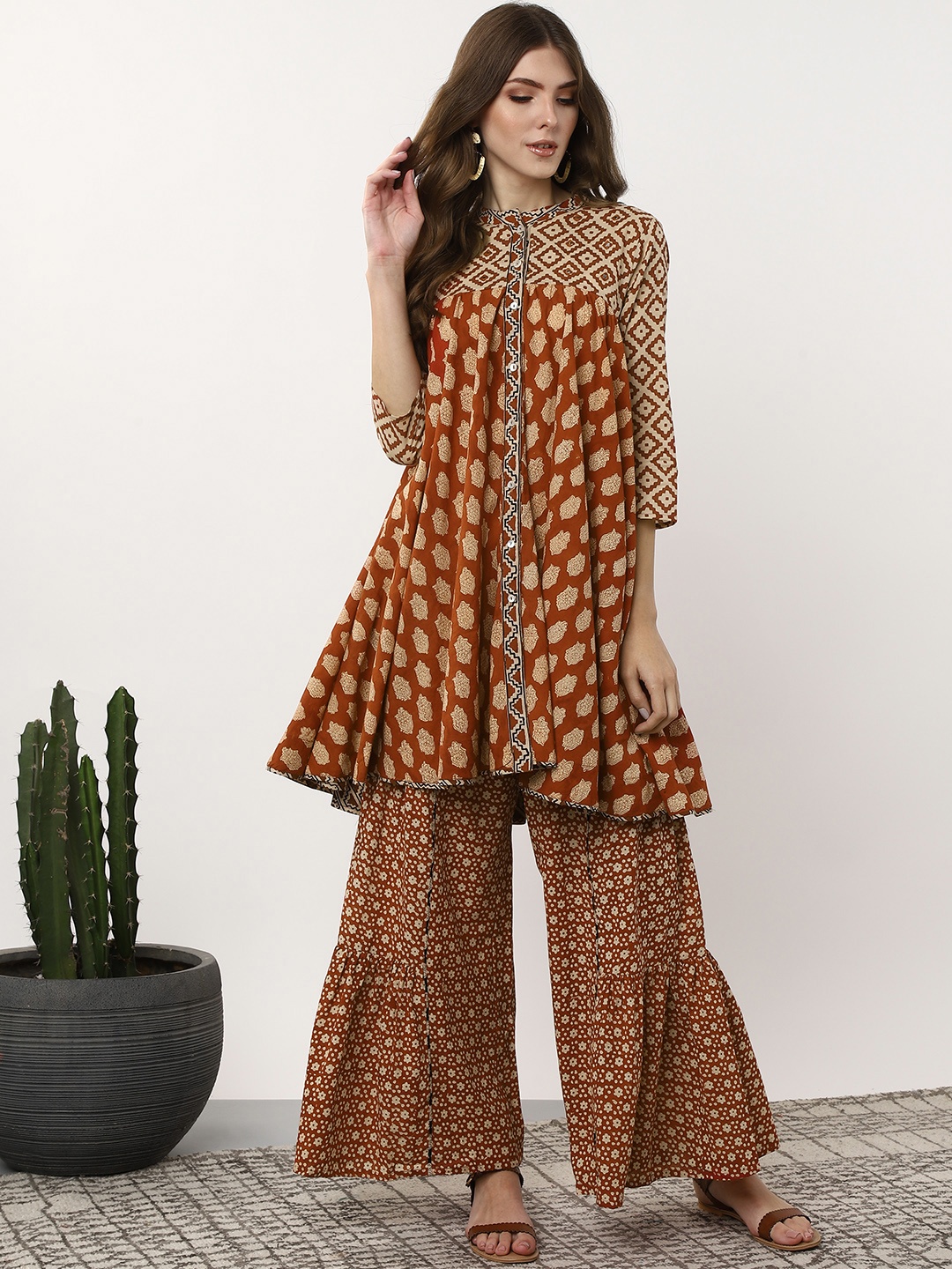 

Sangria Women Rust Red & Beige Printed Kurta with Sharara