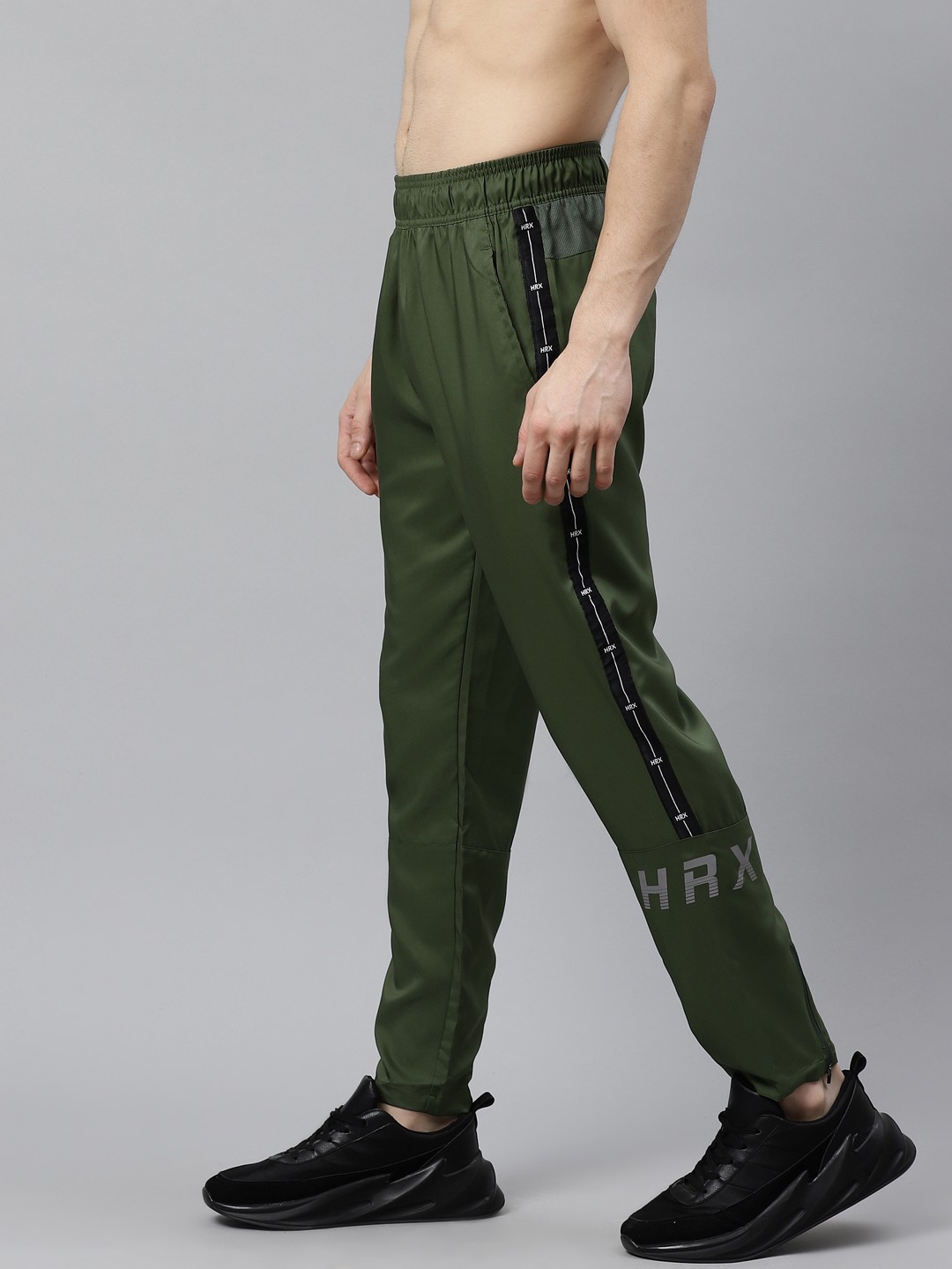 

HRX By Hrithik Roshan Men Black Forest Solid Slim Mid-Rise Rapid-Dry Running Track Pants, Green