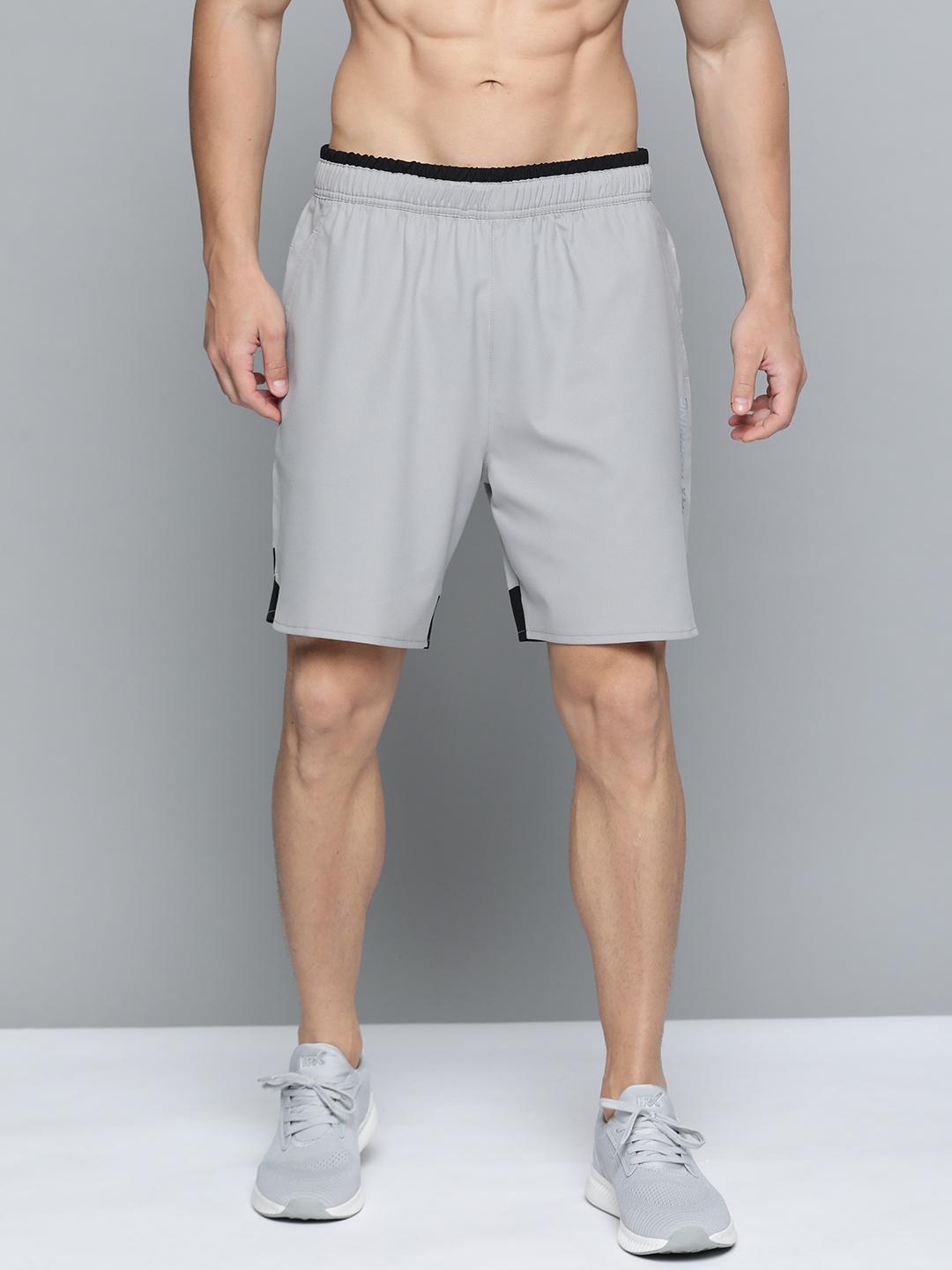 

HRX By Hrithik Roshan Men Wet Weather & Jet Black Colourblock Regular Fit Rapid-Dry Antimicrobial Running Shorts, Grey