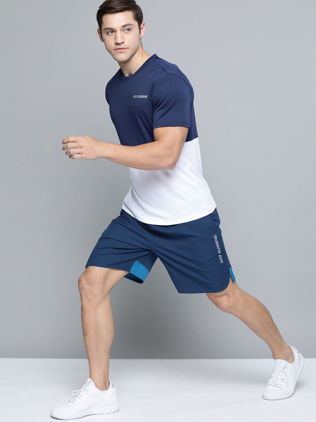 

HRX By Hrithik Roshan Men Estate Blue & Blue Beast Colourblock Regular Fit Rapid-Dry Antimicrobial Running Shorts, Navy blue