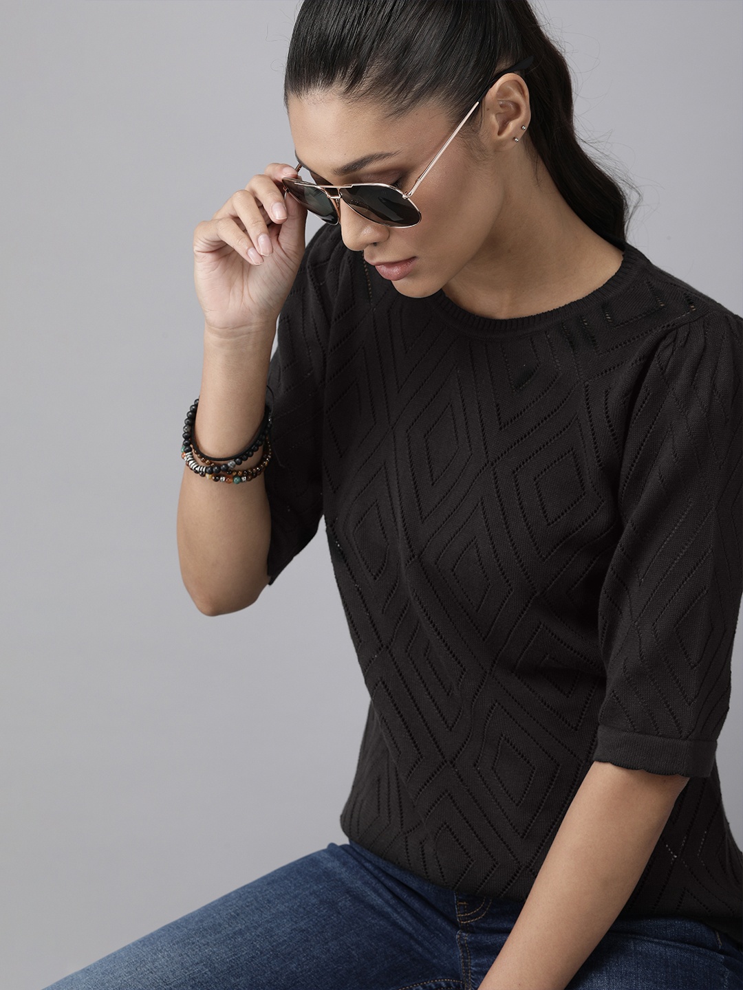 

The Roadster Lifestyle Co Black Puff Sleeves Crochet Knit Top