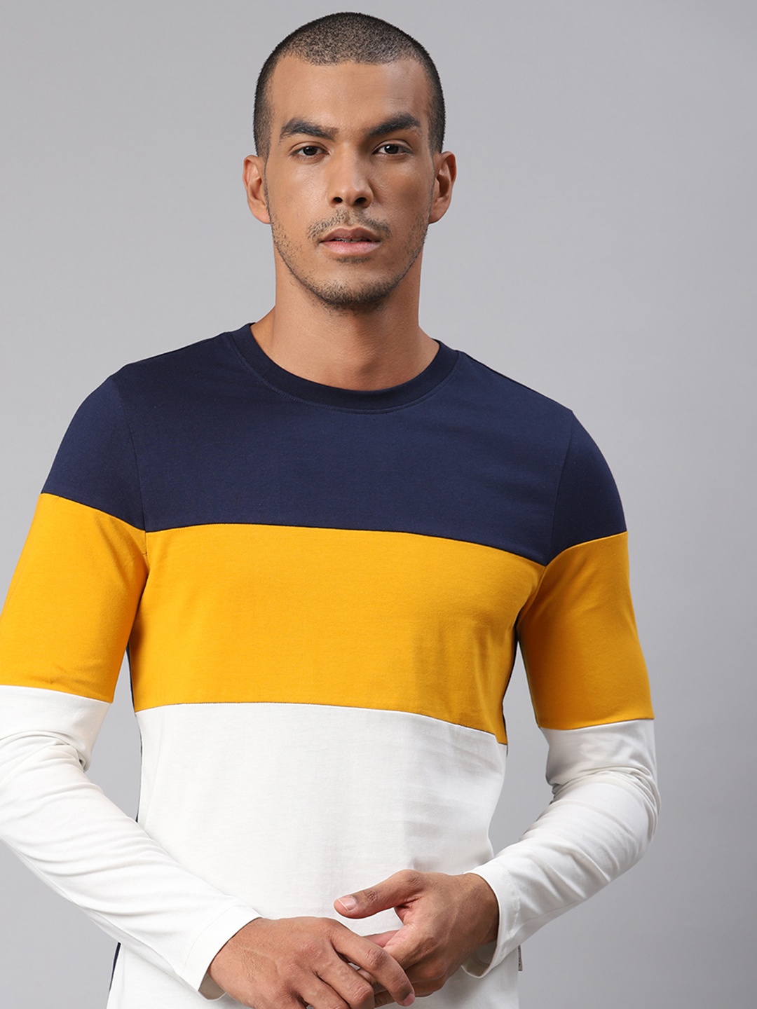 

The Roadster Lifestyle Co Men Navy Blue Colourblocked Round Neck Pure Cotton T-shirt