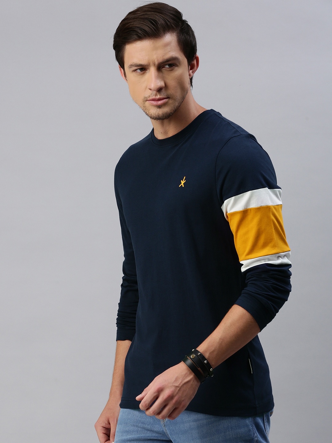 

The Roadster Lifestyle Co Men Navy Blue Colourblocked Round Neck Pure Cotton T-shirt