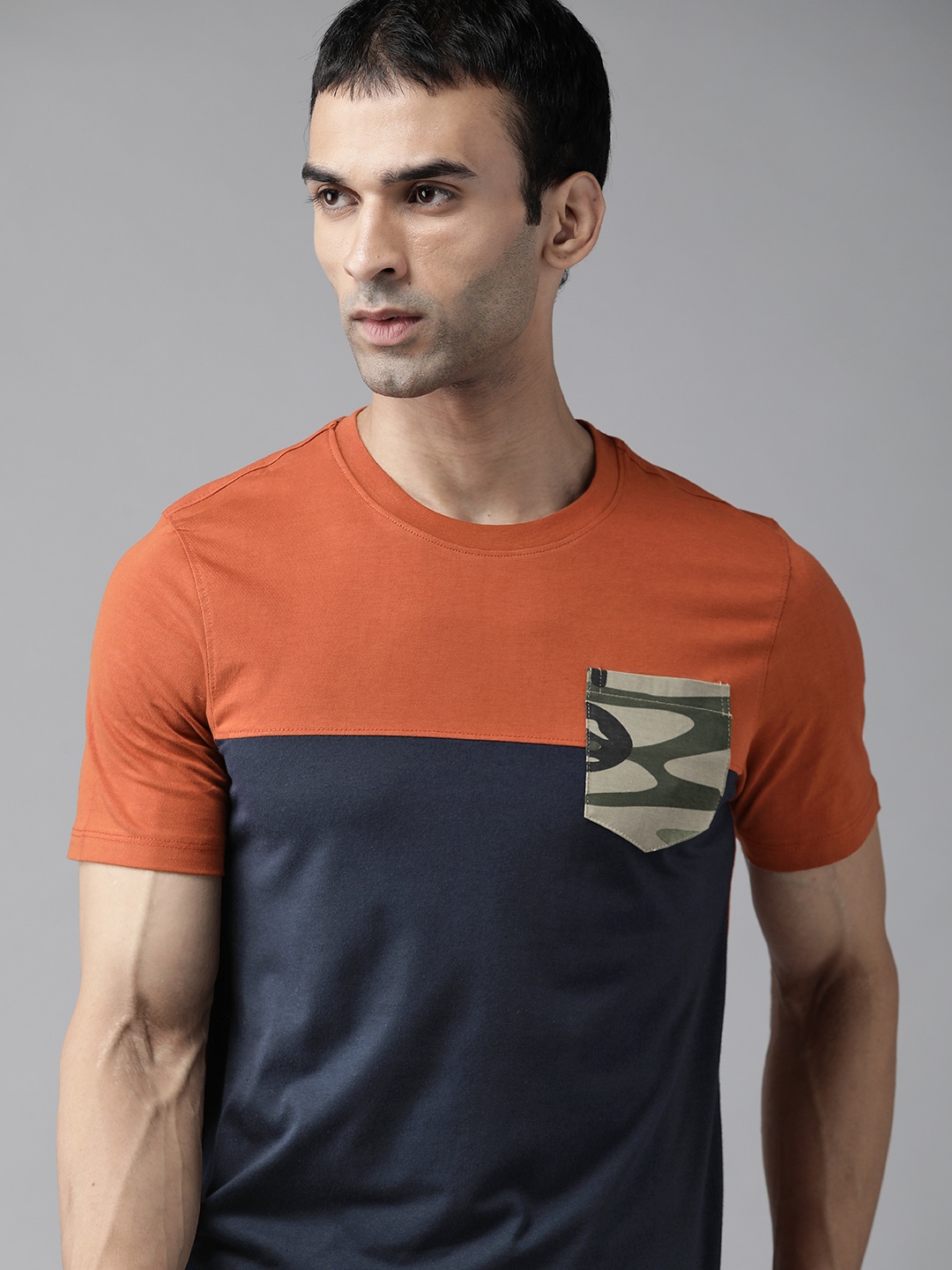 

The Roadster Lifestyle Co Men Navy Blue & Rust Orange Cotton Colourblocked T-shirt