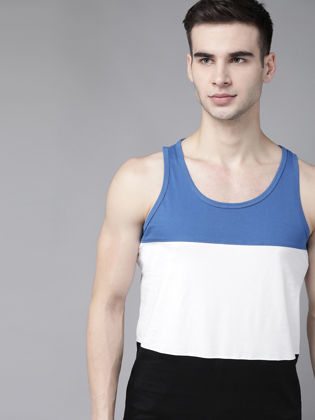

The Roadster Lifestyle Co Men Black & White Pure Cotton Colourblocked T-shirt