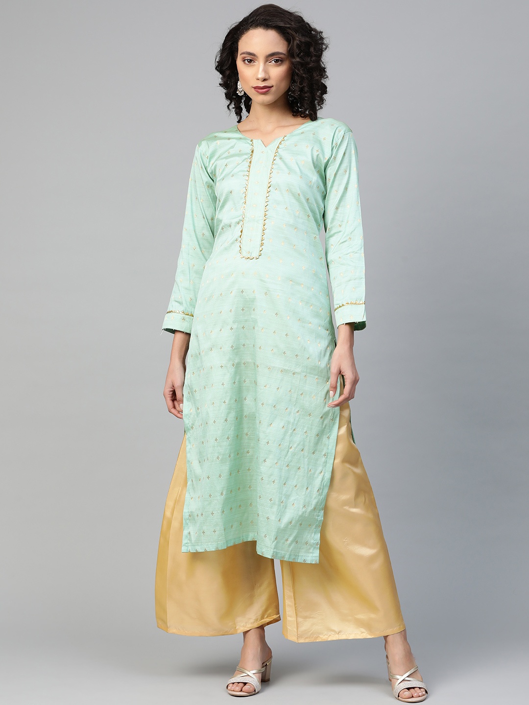 

Chhabra 555 Women Sea Green & Beige Woven Design Kurta with Palazzos