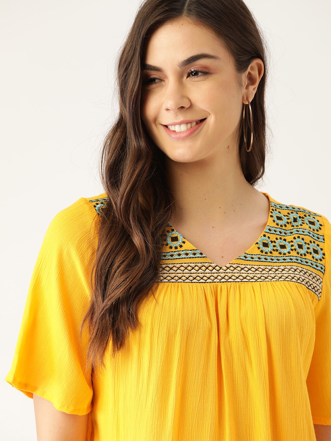 

DressBerry Yellow Solid Flared Sleeves Regular Top