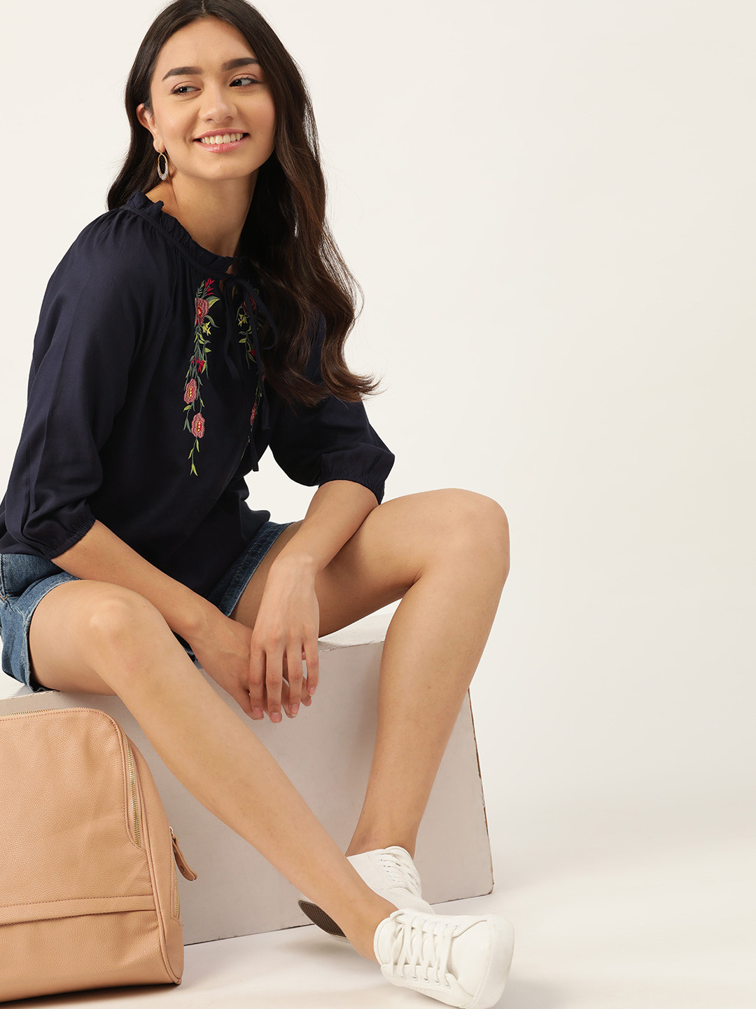 

DressBerry Navy Blue Floral Embroidered Tie-Up Neck Regular Top