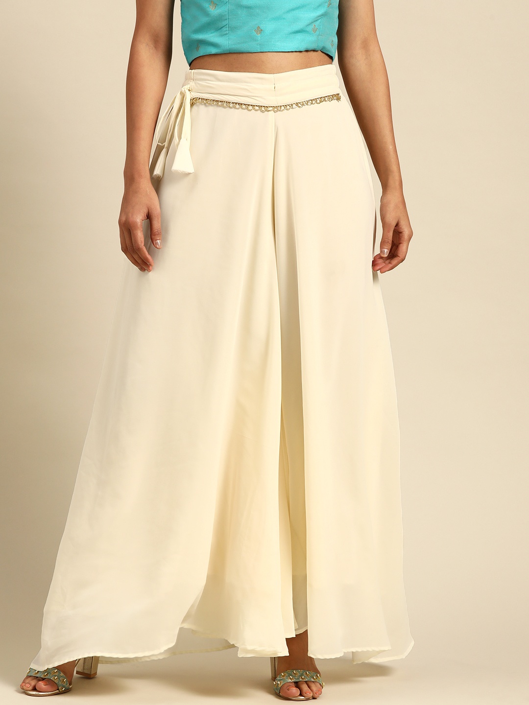 

TAG 7 Women Off-White Solid Flared Palazzos
