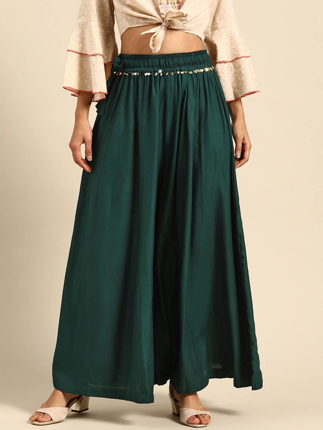 

TAG 7 Women Green Solid Flared Palazzos