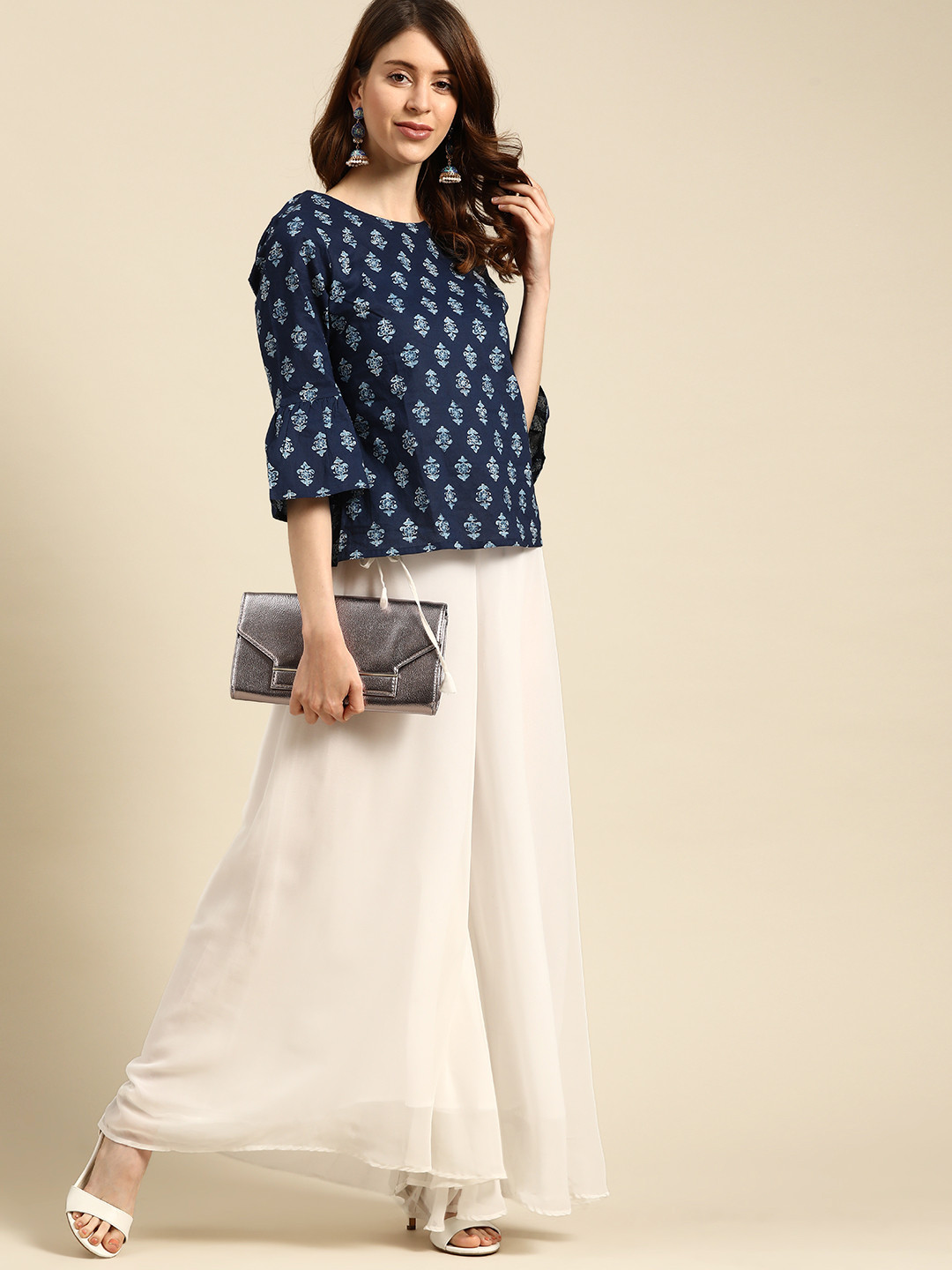

TAG 7 Women White Solid Flared Palazzos
