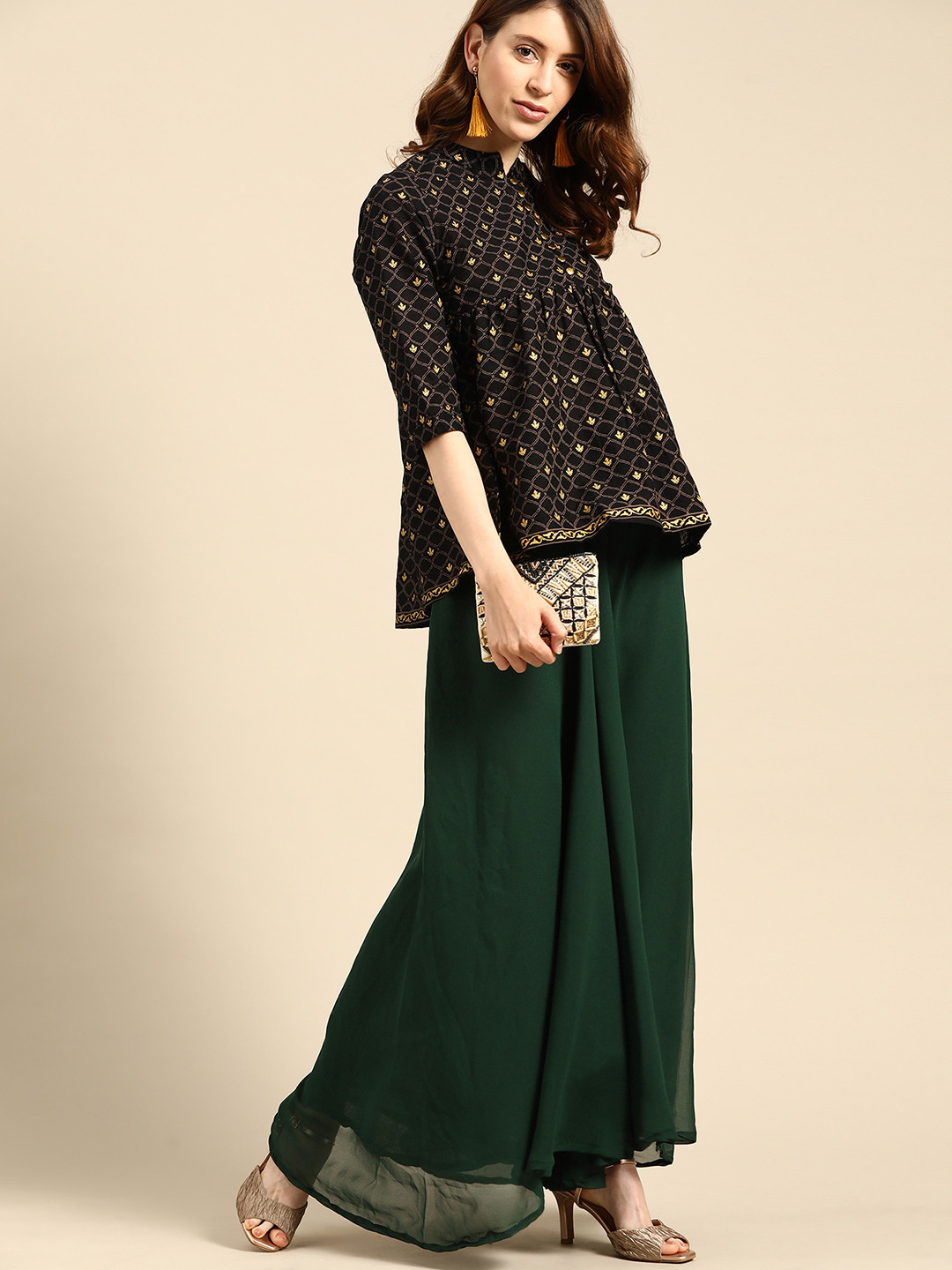 

TAG 7 Women Green Solid Flared Palazzos