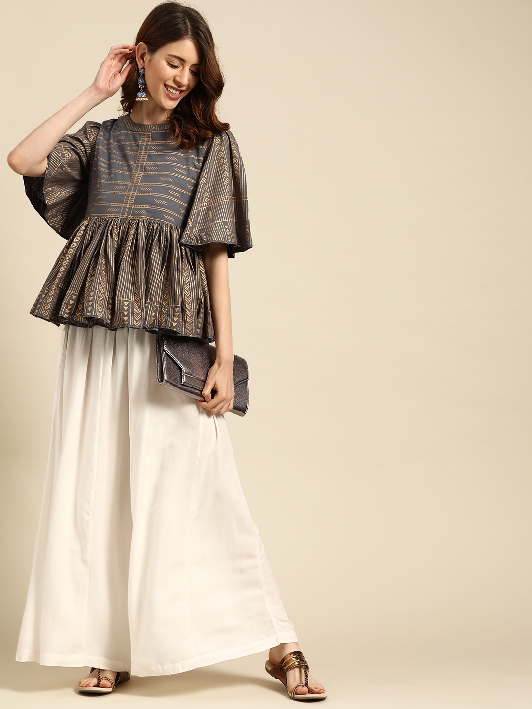 

TAG 7 Women White Solid Flared Palazzos