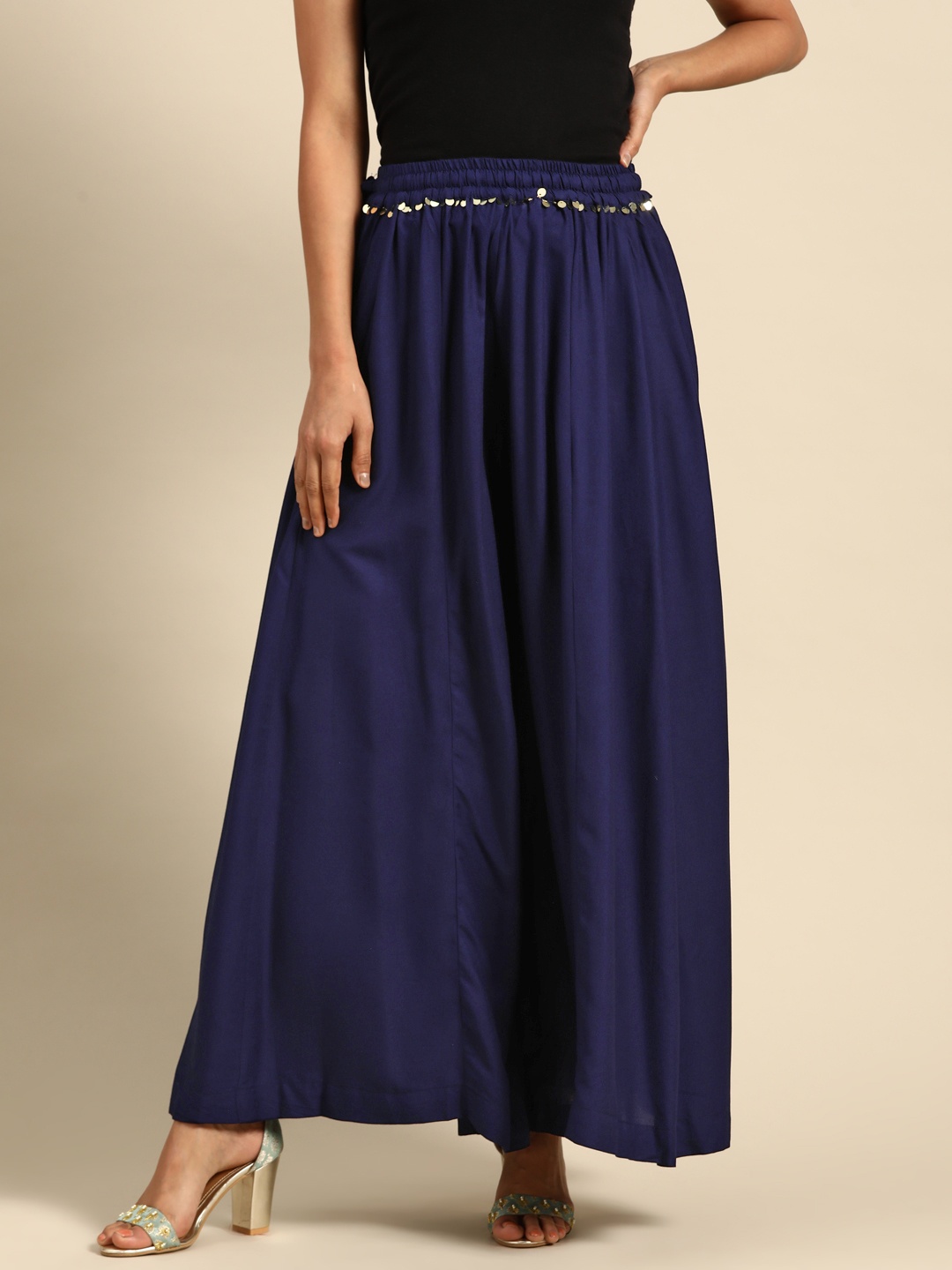 

TAG 7 Women Navy Blue Solid Flared Palazzos