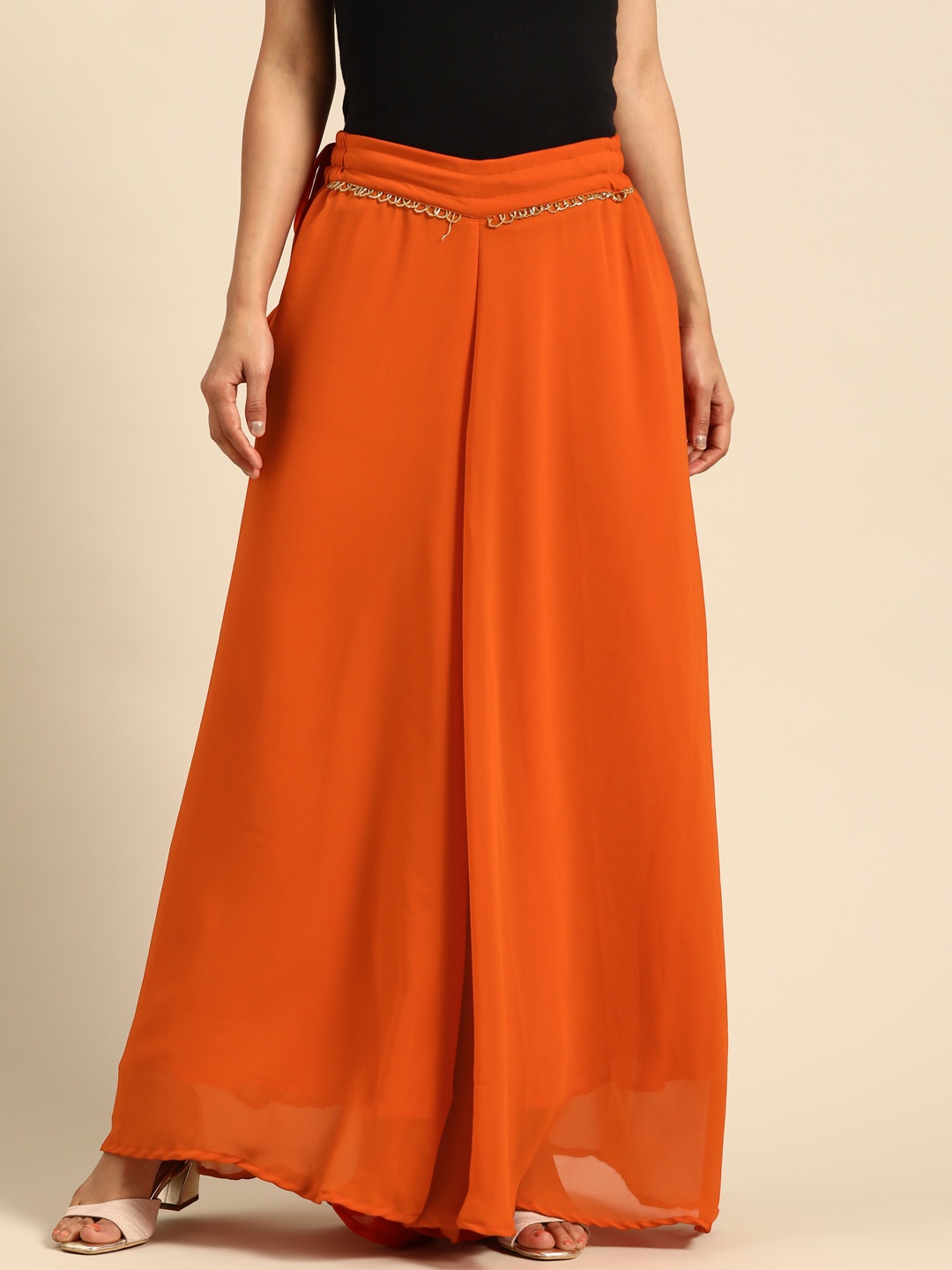 

TAG 7 Women Rust Orange Solid Flared Palazzos