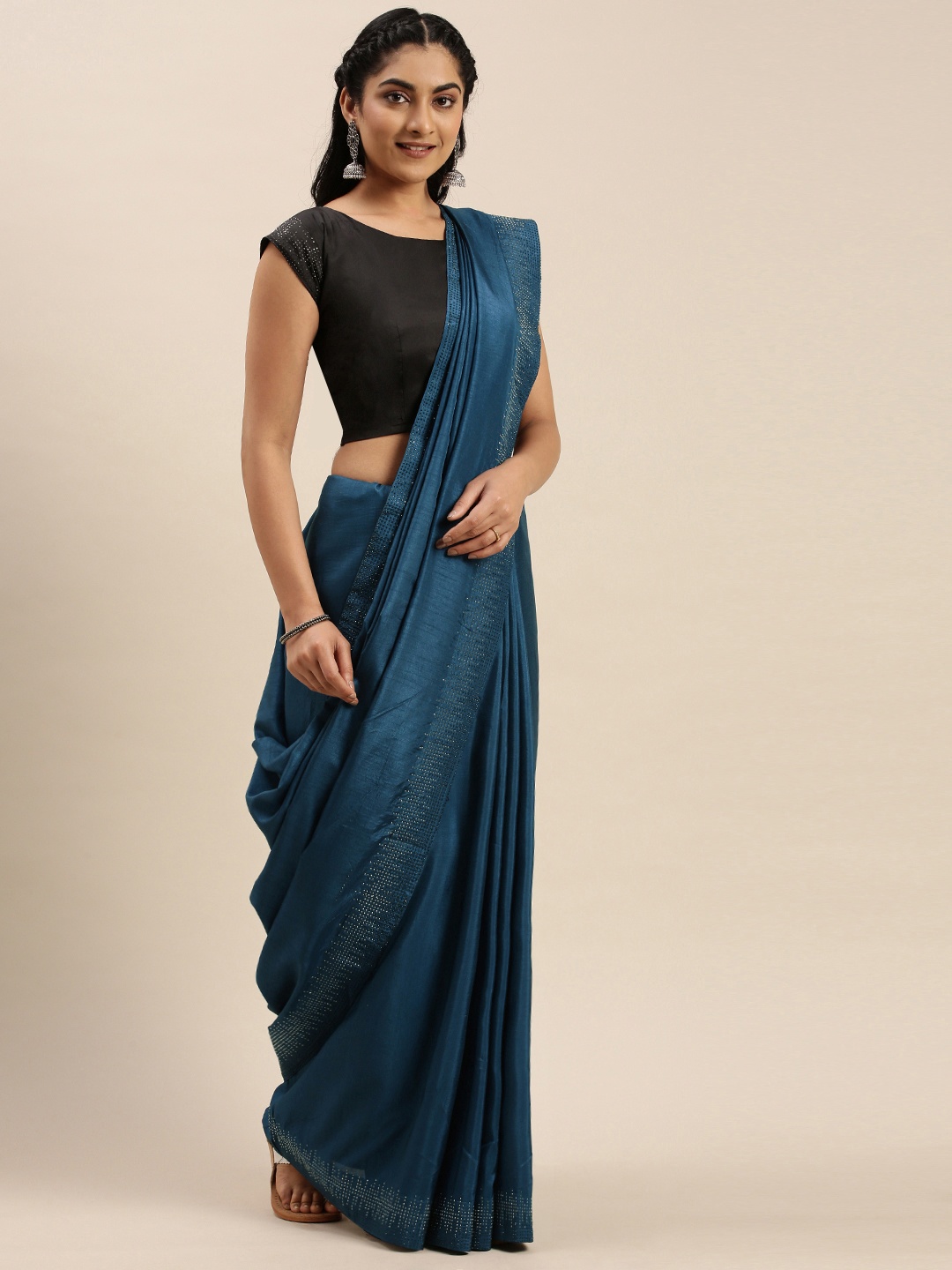 

Shaily Navy Blue Solid Embellished Border Saree