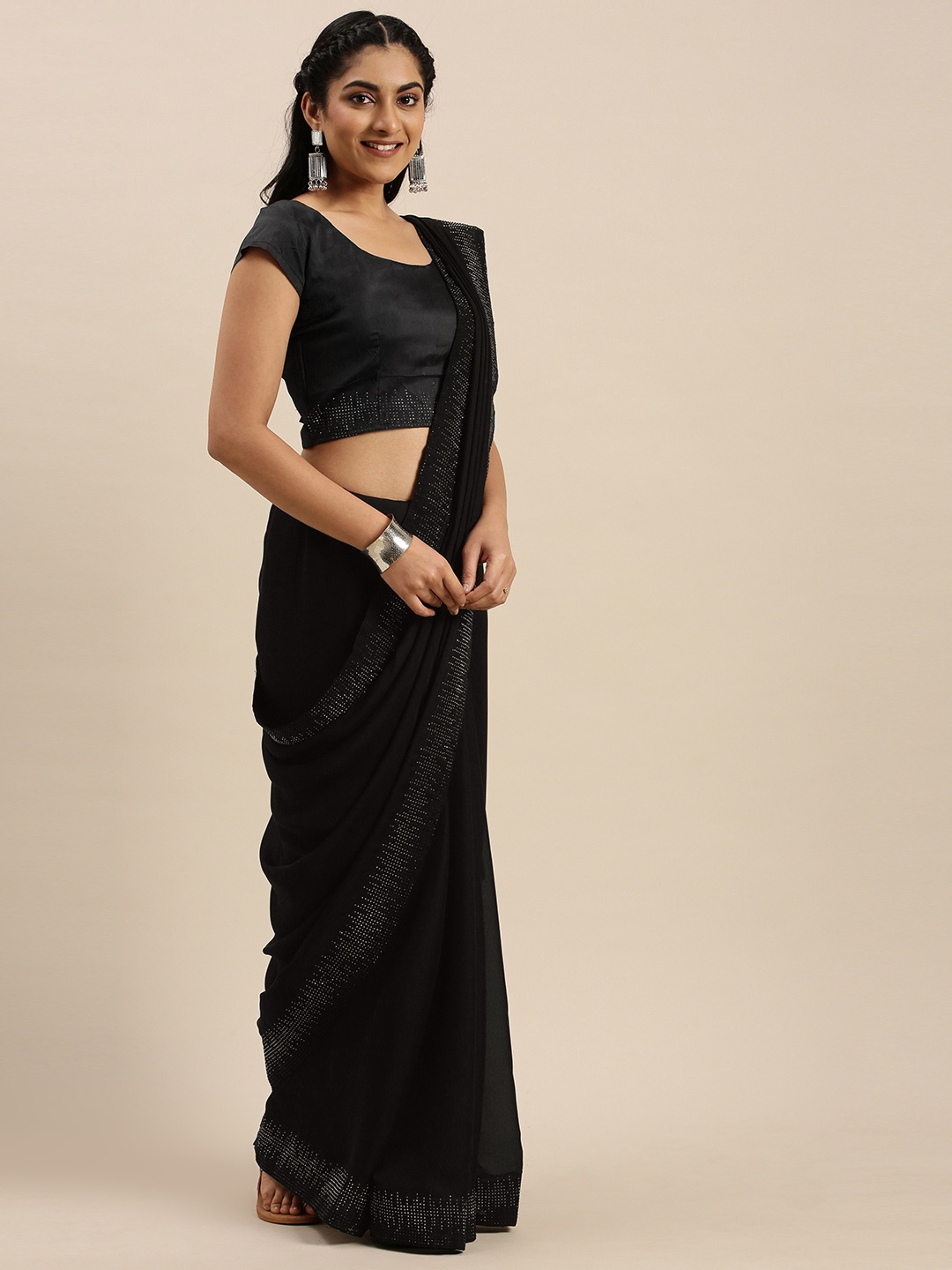 

Shaily Black Solid Satin Embellished Border Saree