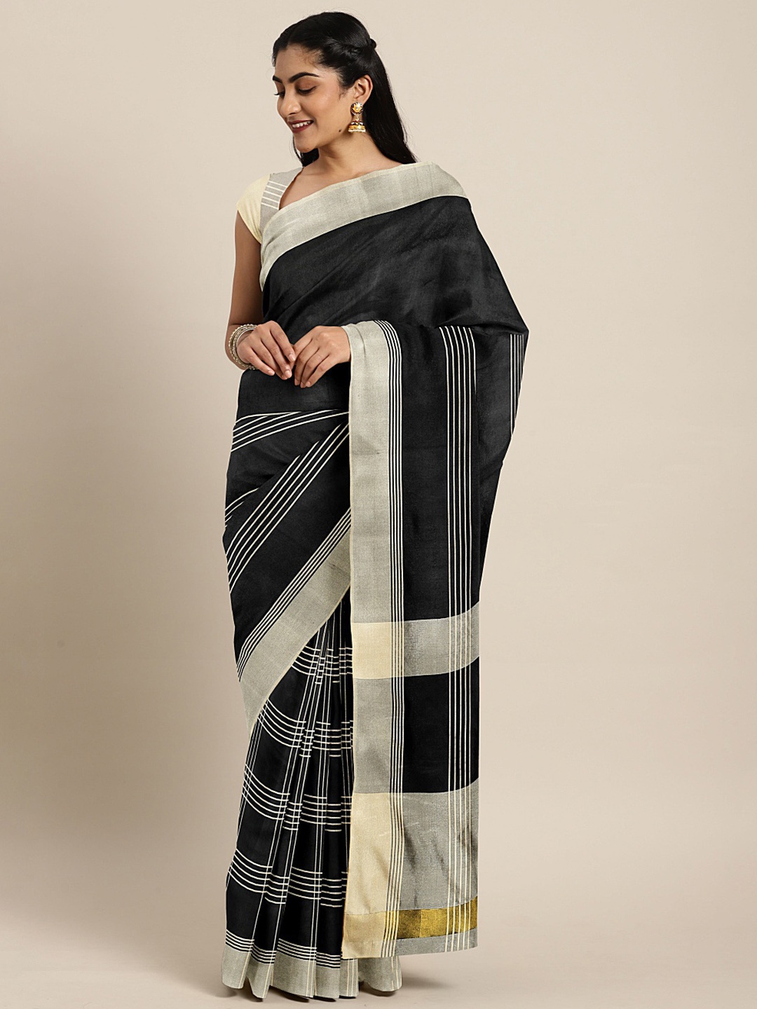 

Mitera Black & Beige Striped Saree