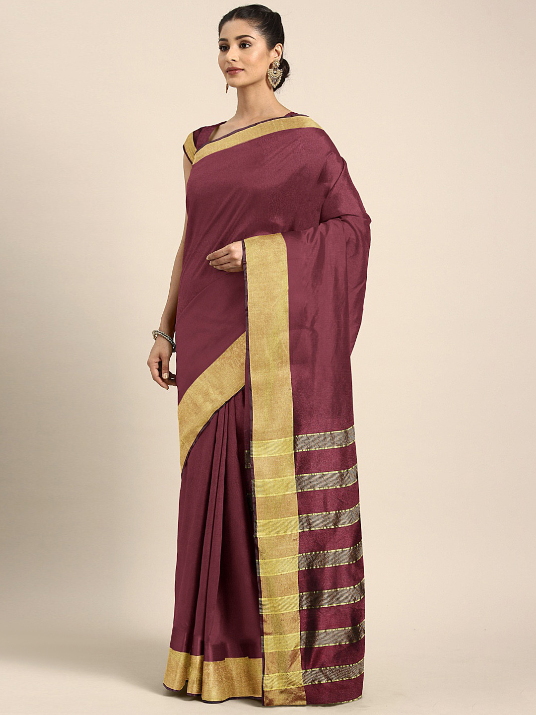 

Mitera Brown Solid Saree