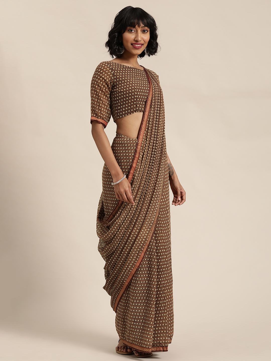 

Shaily Brown & Beige Printed Saree