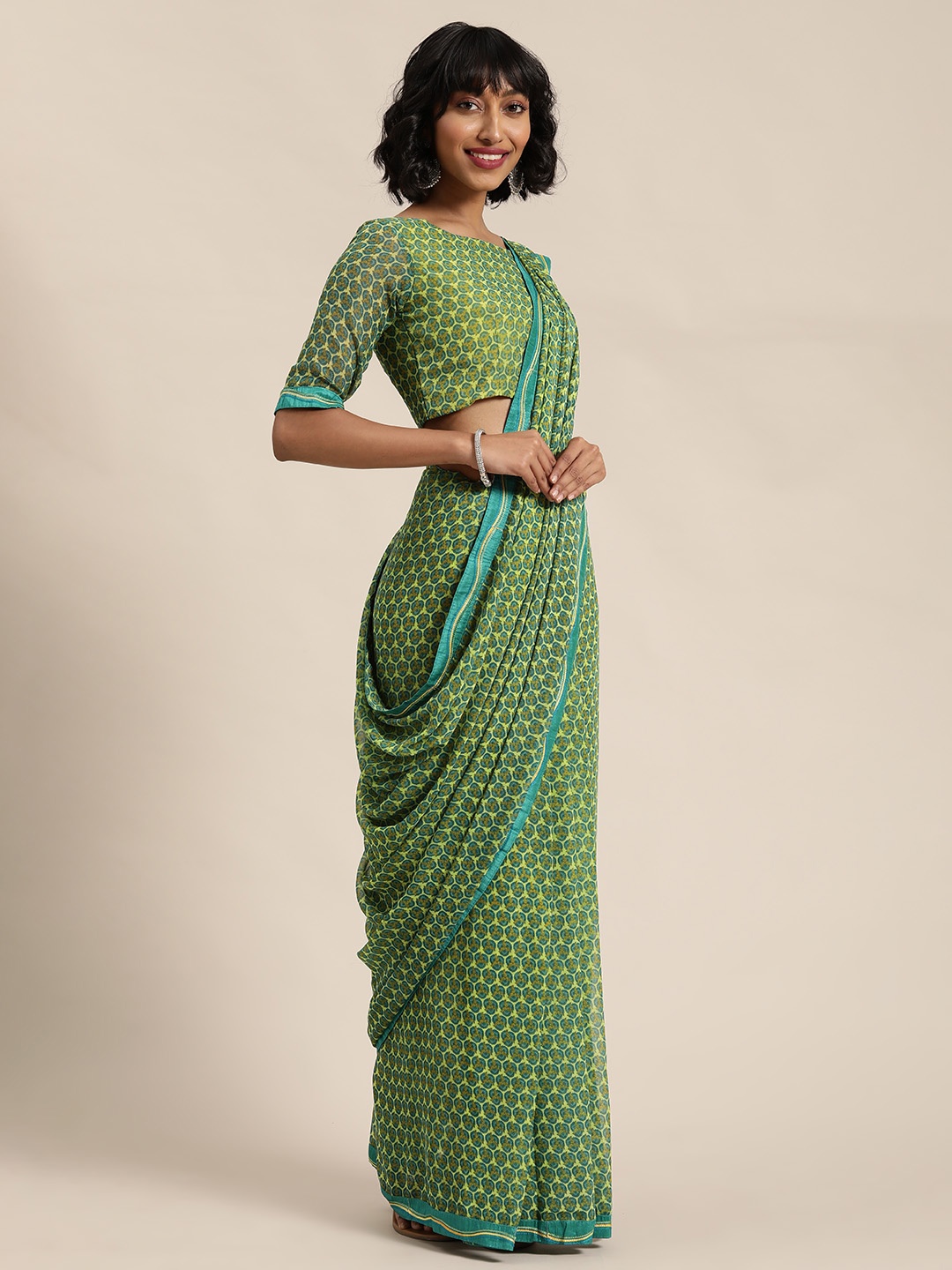 

Shaily Green & Beige Printed Saree