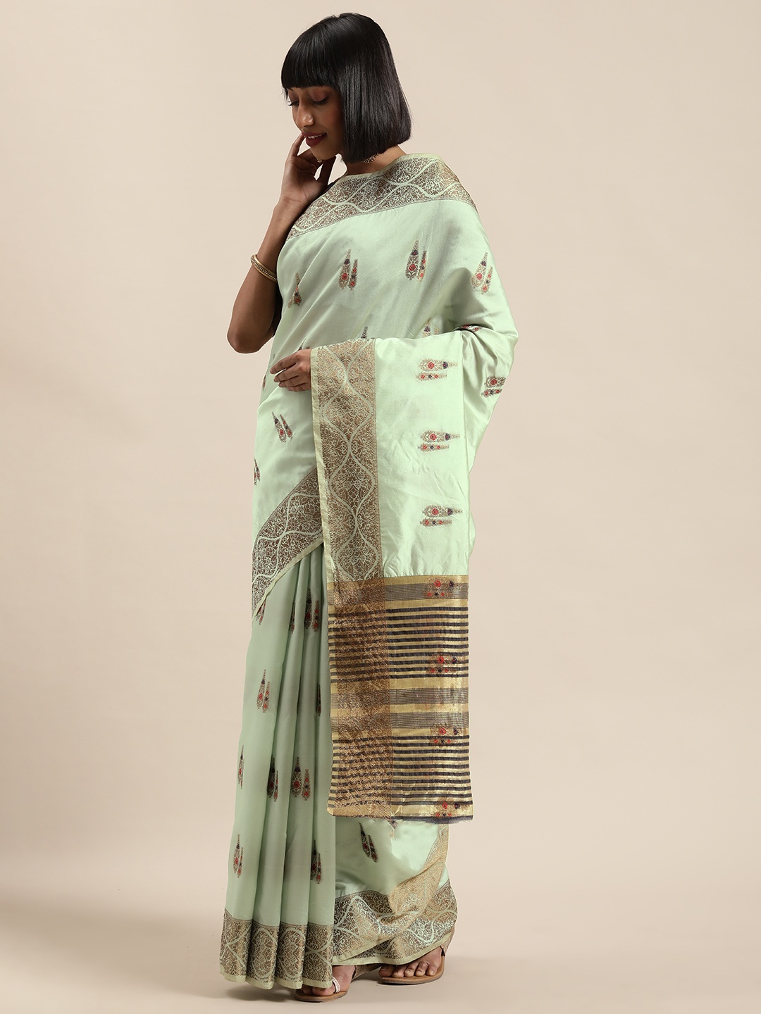 

Shaily Sea Green & Gold-Toned Silk Blend Woven Design Saree