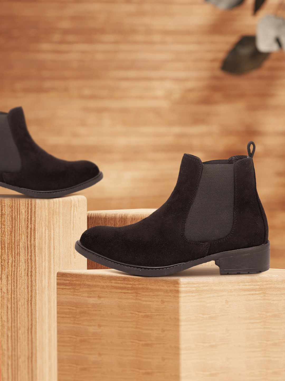 

Rocia Women Black Solid Heeled Boots