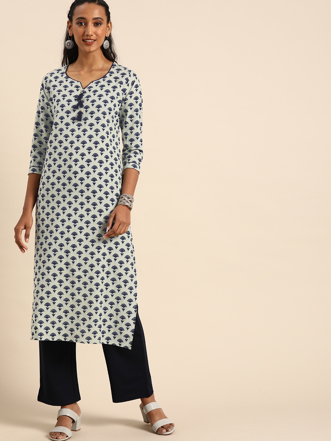 

Rajnandini Women Off White & Navy Blue Ethnic Motifs Printed Kurta