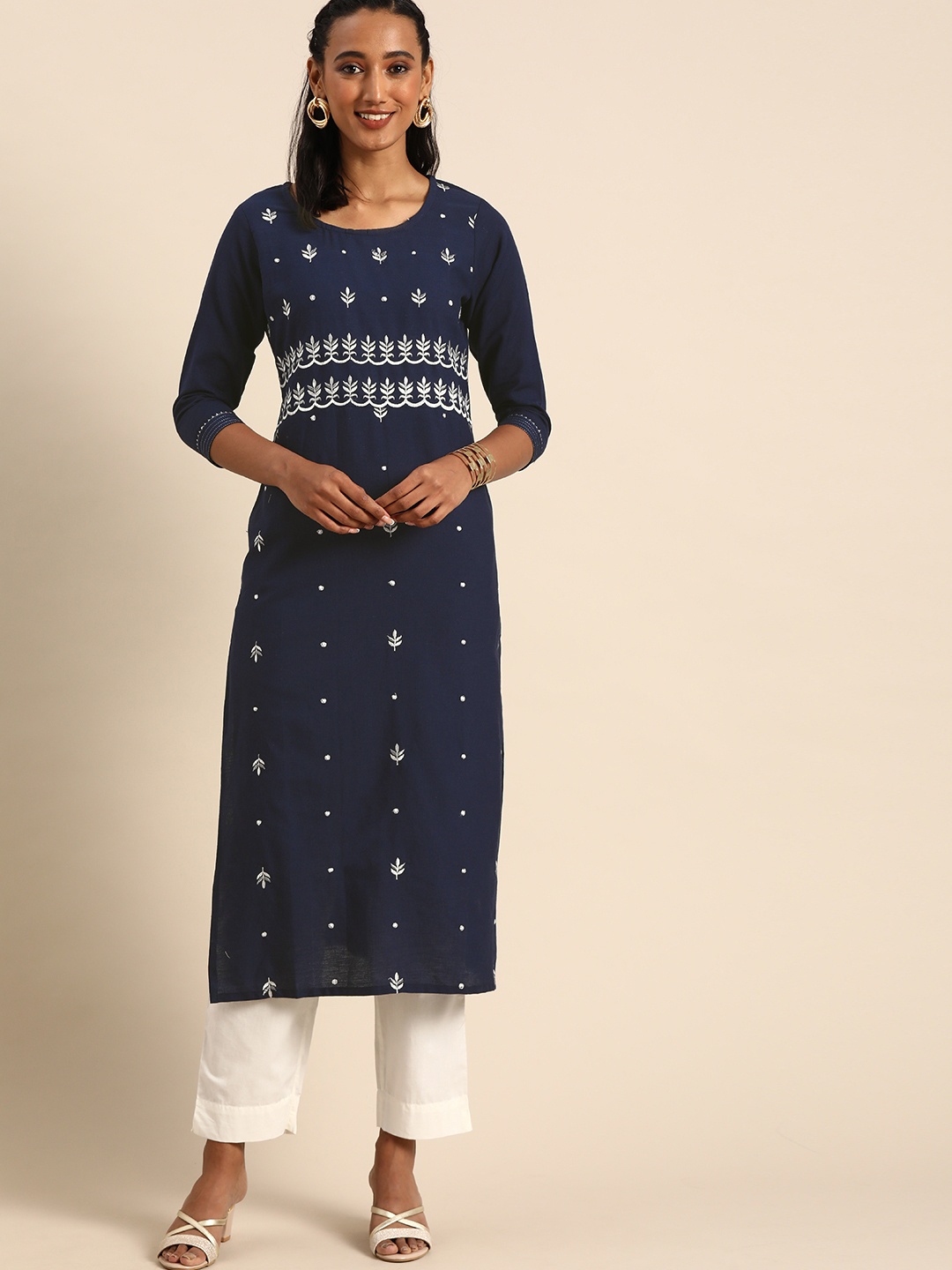 

Rajnandini Women Navy Blue & White Ethnic Motifs Embroidered Kurta