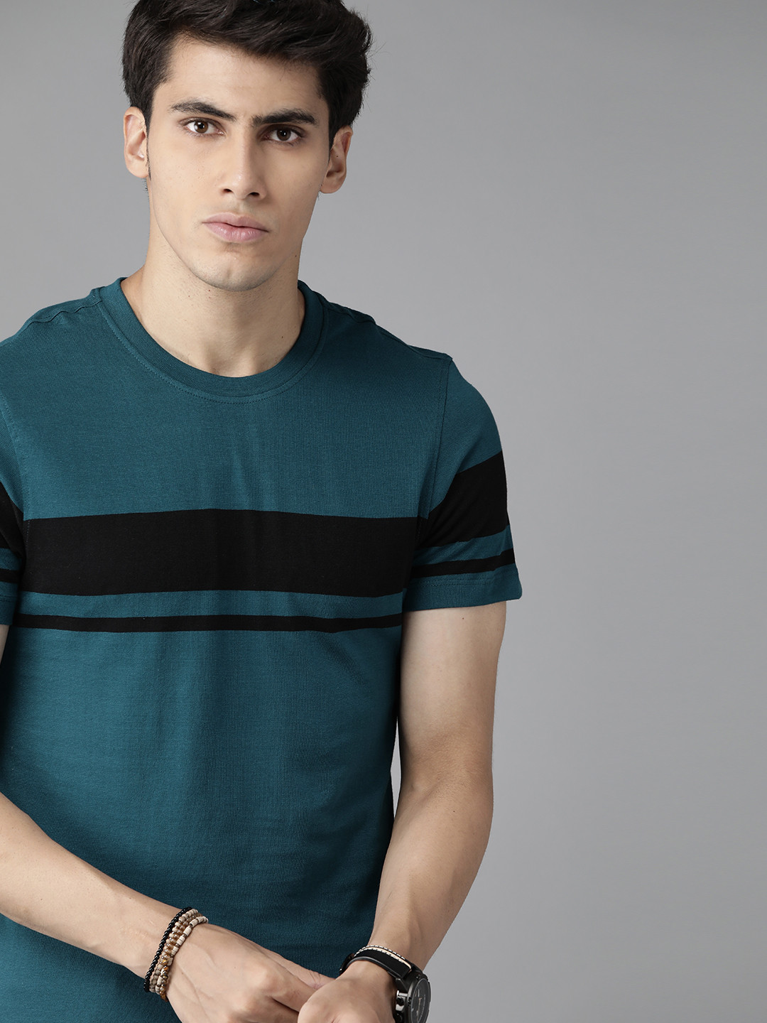 

The Roadster Lifestyle Co Men Teal Green & Black Cotton Striped T-shirt