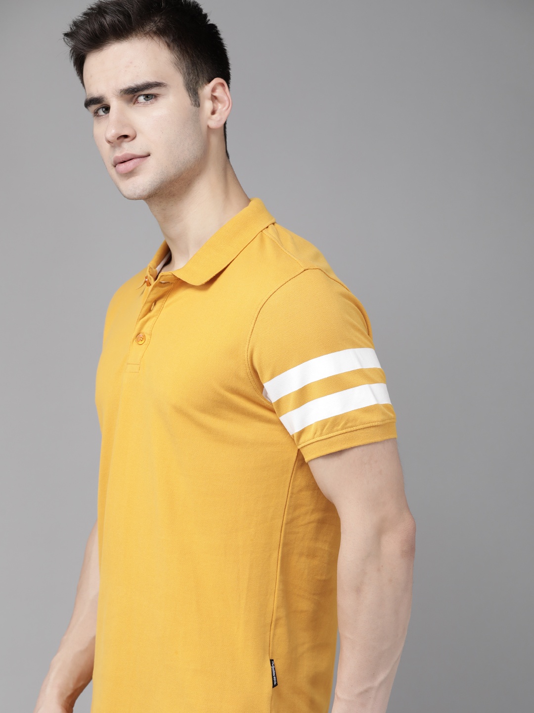 

The Roadster Lifestyle Co Men Mustard Yellow Pure Cotton Solid Polo Collar T-shirt