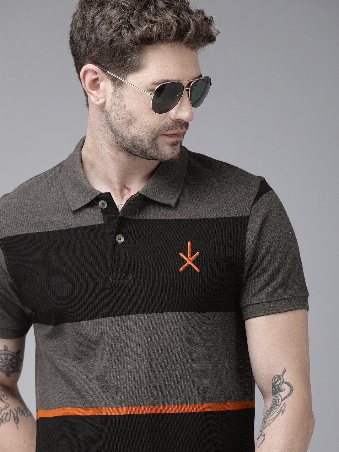 

The Roadster Lifestyle Co Men Black Orange Striped Polo Collar Pure Cotton T-shirt