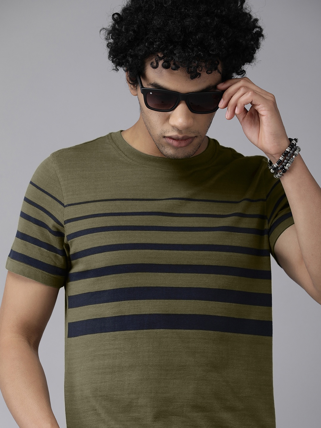 

The Roadster Lifestyle Co Men Olive Green Black Striped Pure Cotton T-shirt
