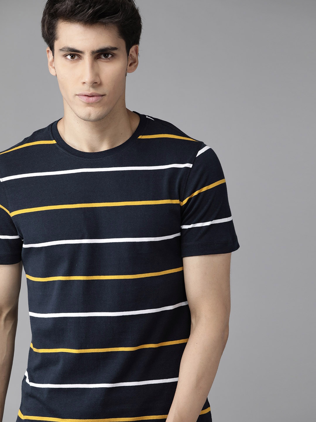 

The Roadster Lifestyle Co Men Navy Blue & Yellow Striped Cotton T-shirt