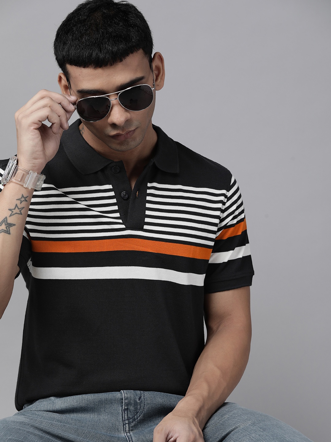 

Roadster Men Black & White Striped Polo Collar Pure Cotton T-shirt
