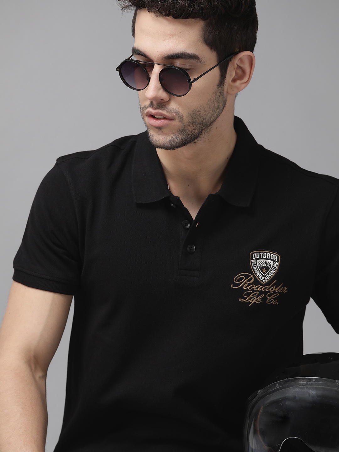 

The Roadster Lifestyle Co Men Black Solid Pure Cotton Polo Collar Pure Cotton T-shirt