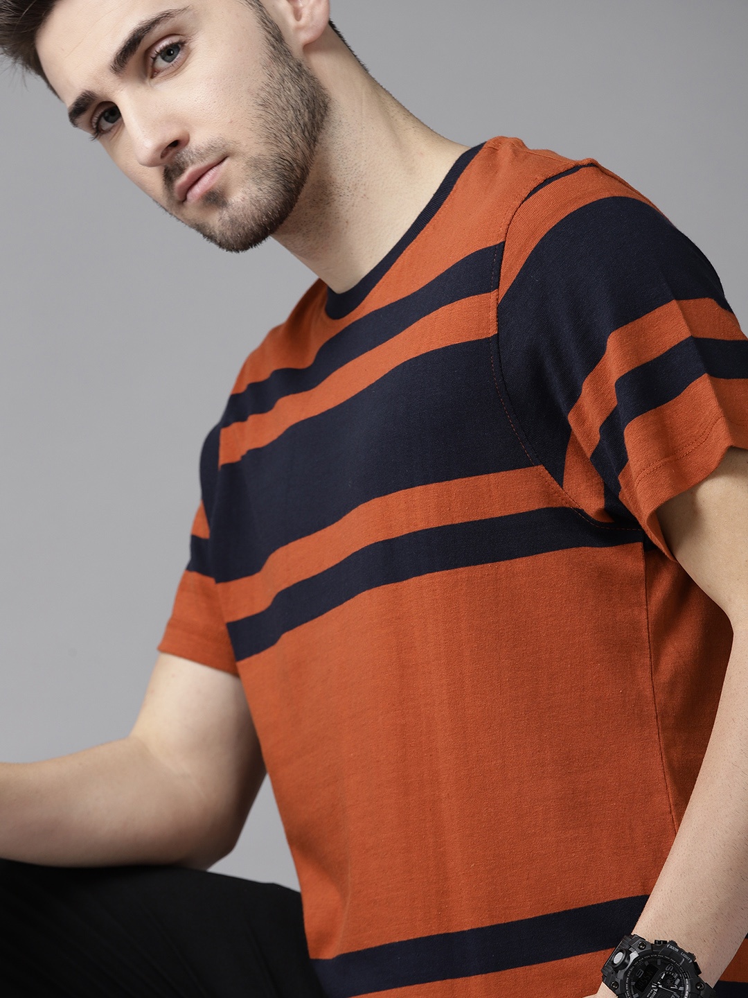 

The Roadster Lifestyle Co Men Rust Orange & Navy Blue Striped Pure Cotton T-shirt