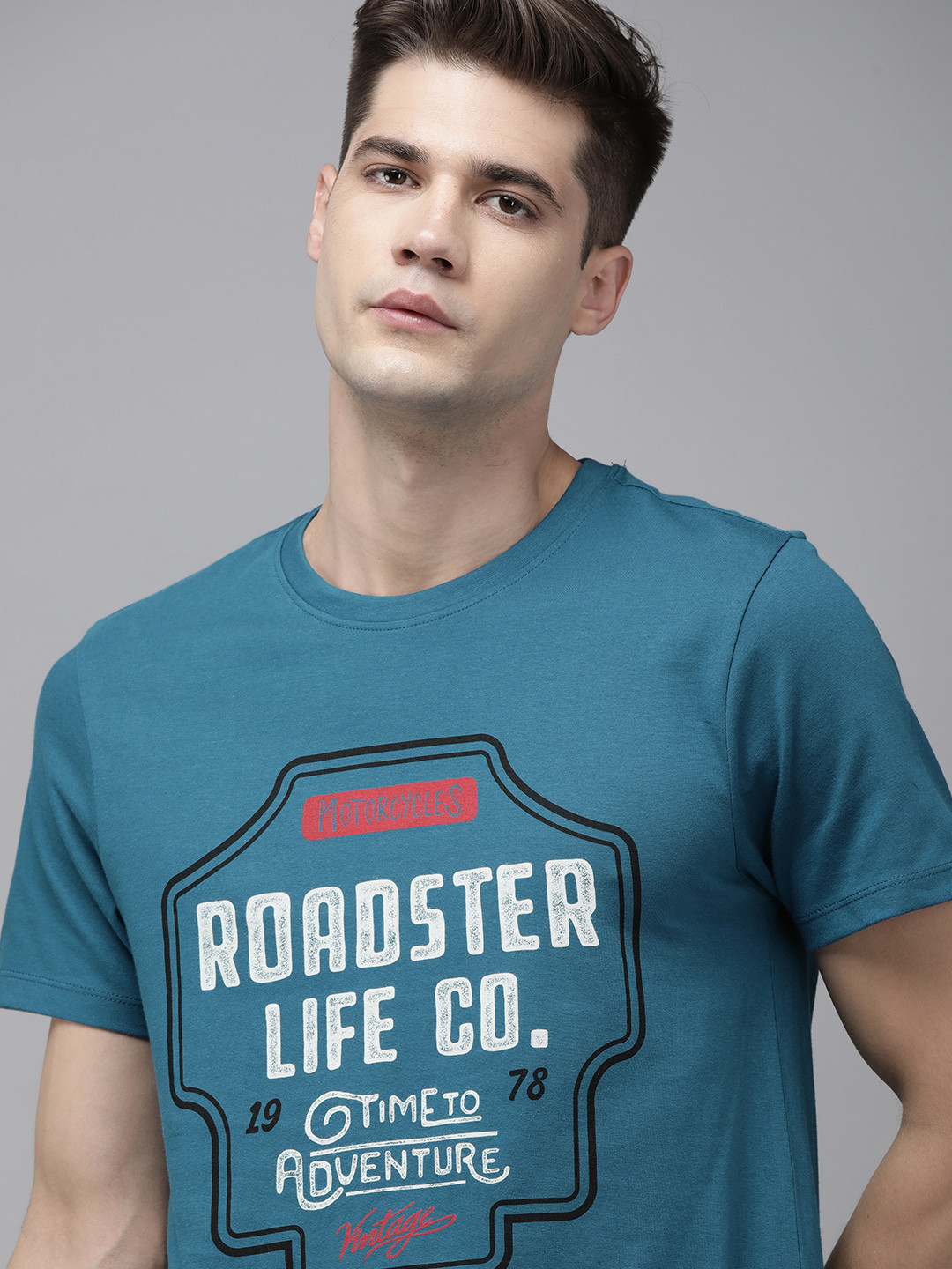 

The Roadster Lifestyle Co Men Blue Brand Logo Printed Pure Cotton T-shirt