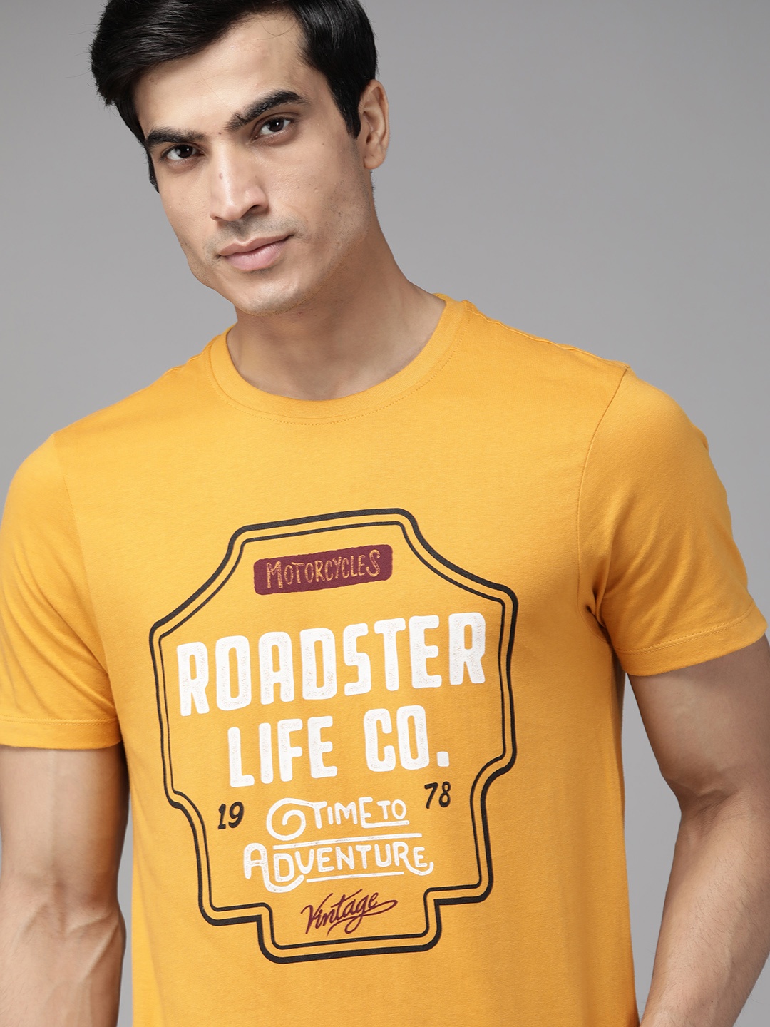 

The Roadster Lifestyle Co Men Mustard Yellow & White Brand Logo Print Cotton T-shirt