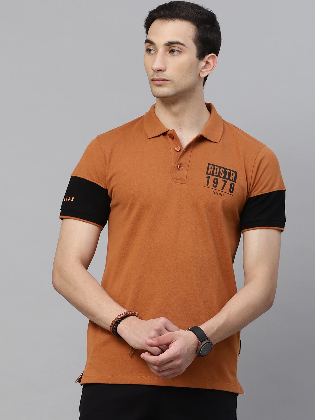 

The Roadster Lifestyle Co Men Rust Brown Black Cotton Solid Polo Collar Pure Cotton T-shirt